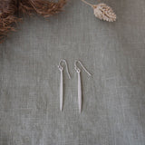 warrior pose earrings